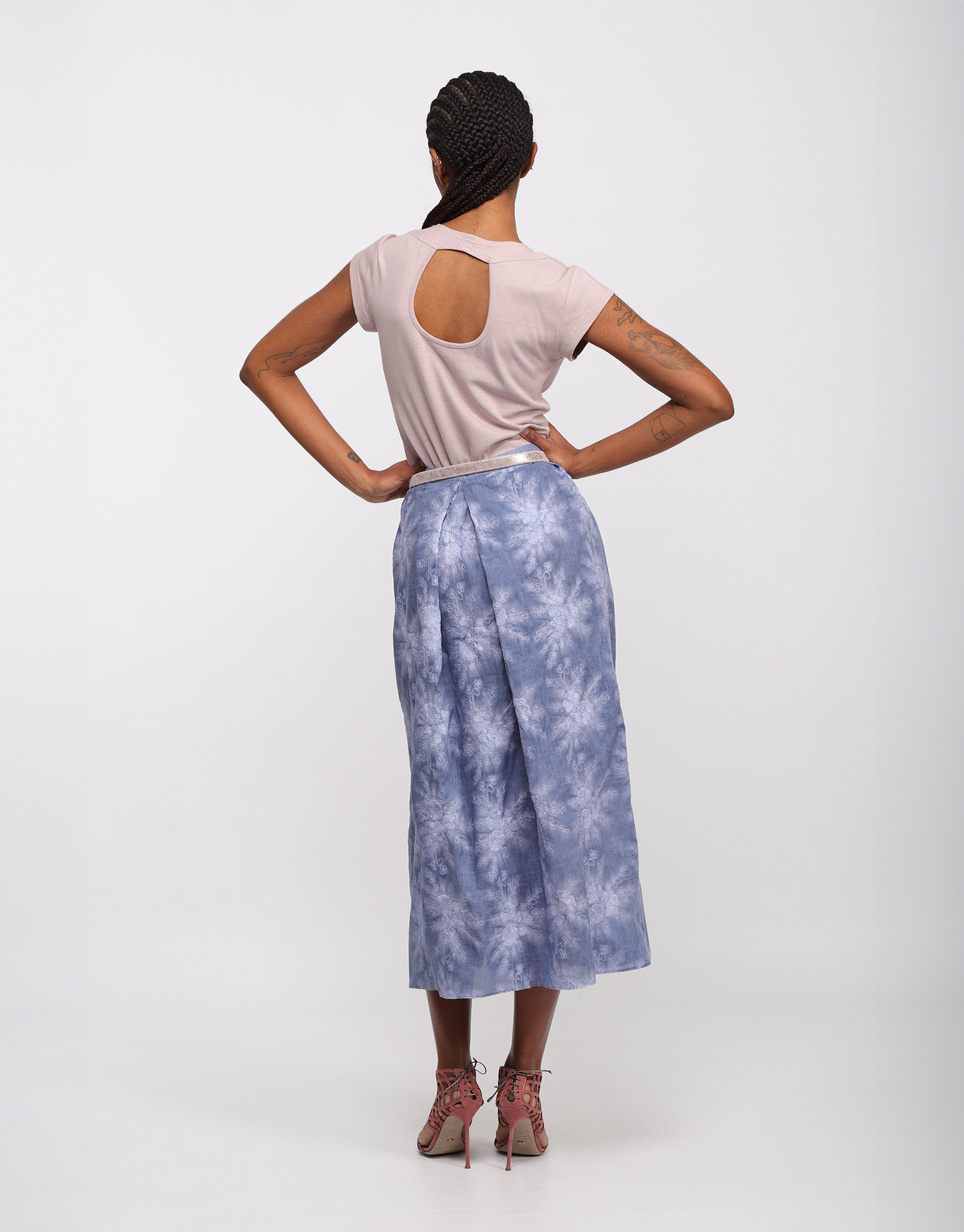 Long pleated skirt in embroidered faded denim blue cotton canvas