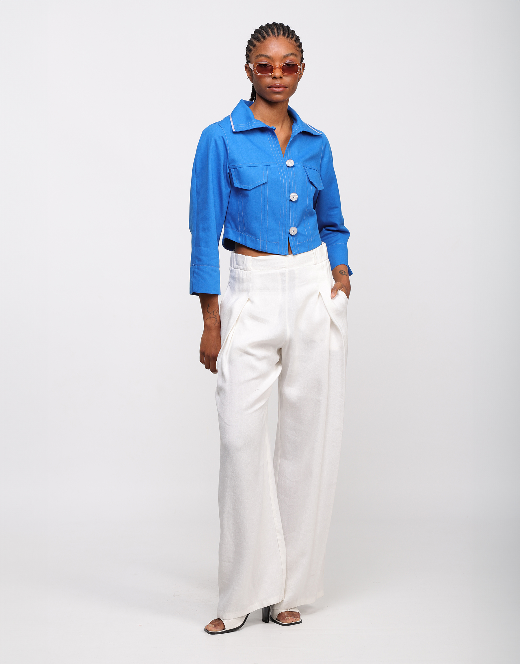 Short fitted jacket stitched chic casual in ivory crepe or royal blue canvas