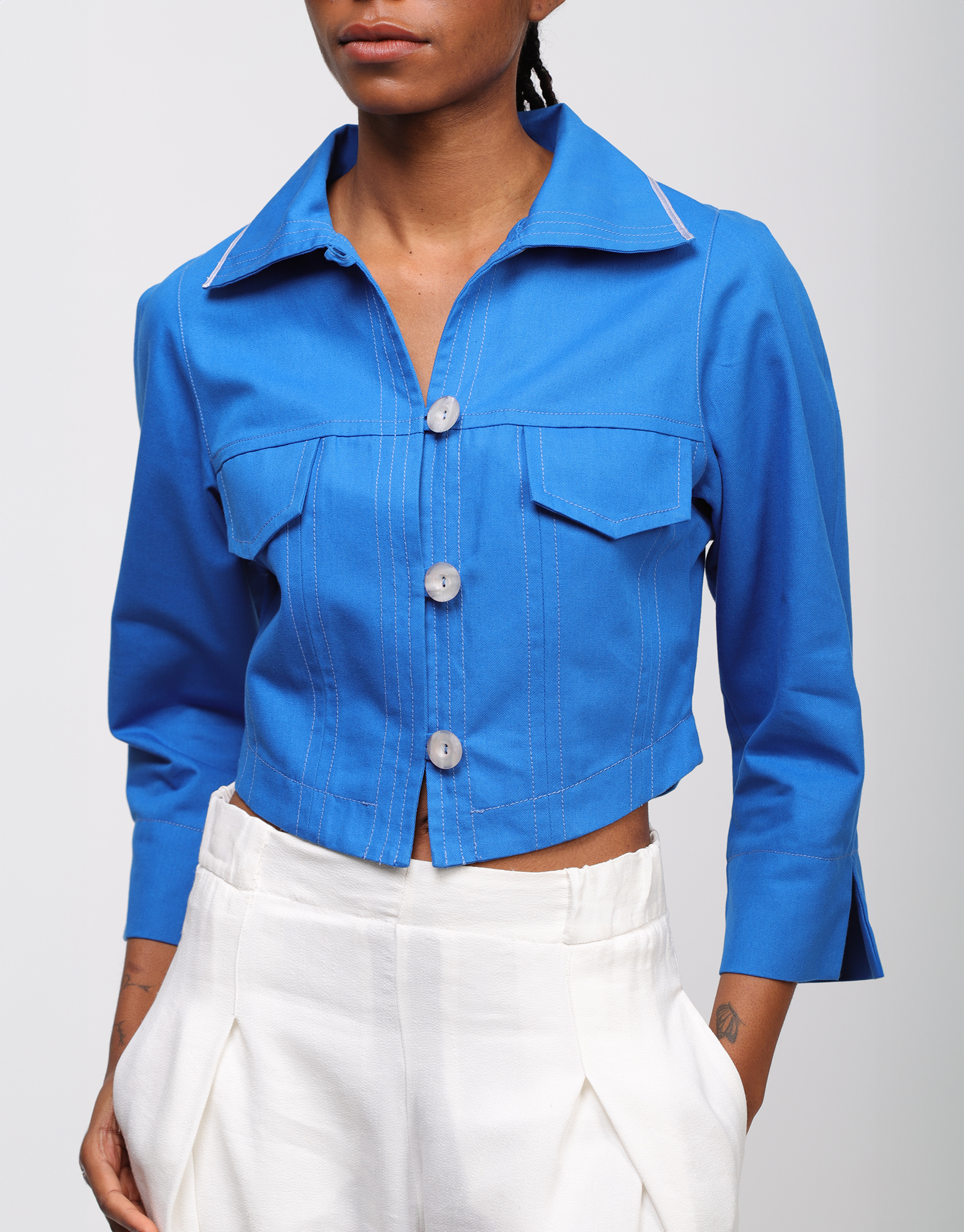 Short fitted jacket stitched chic casual in ivory crepe or royal blue canvas