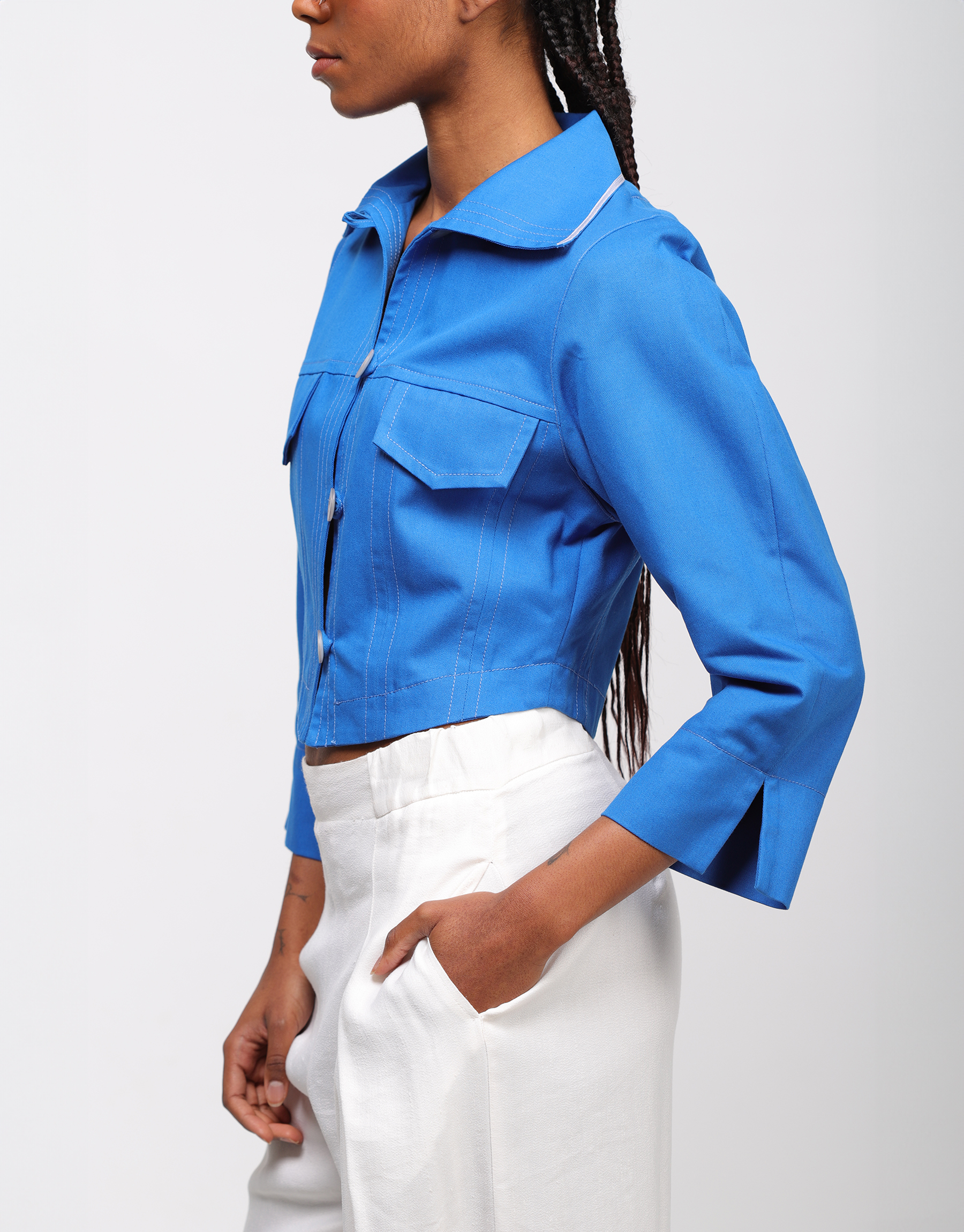 Short fitted jacket stitched chic casual in ivory crepe or royal blue canvas