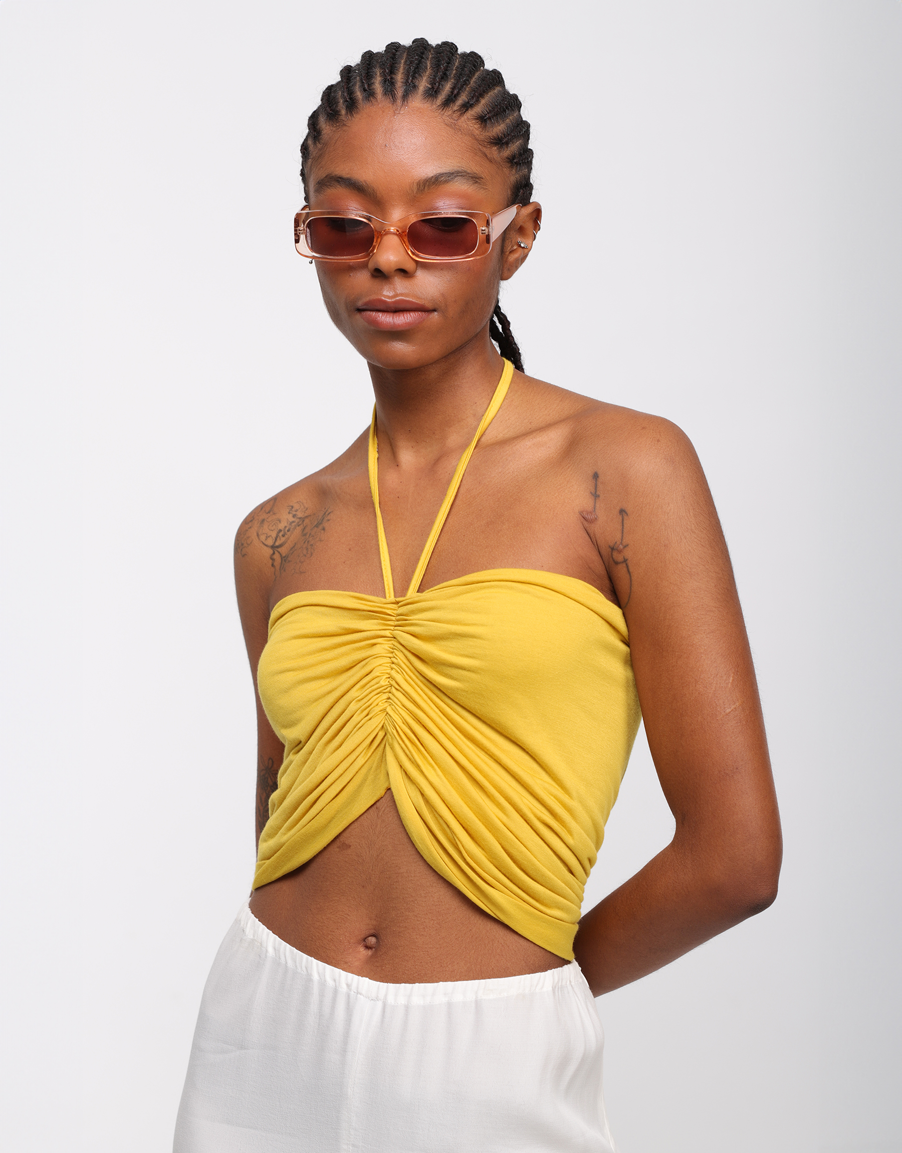 Top draped in yellow cotton jersey