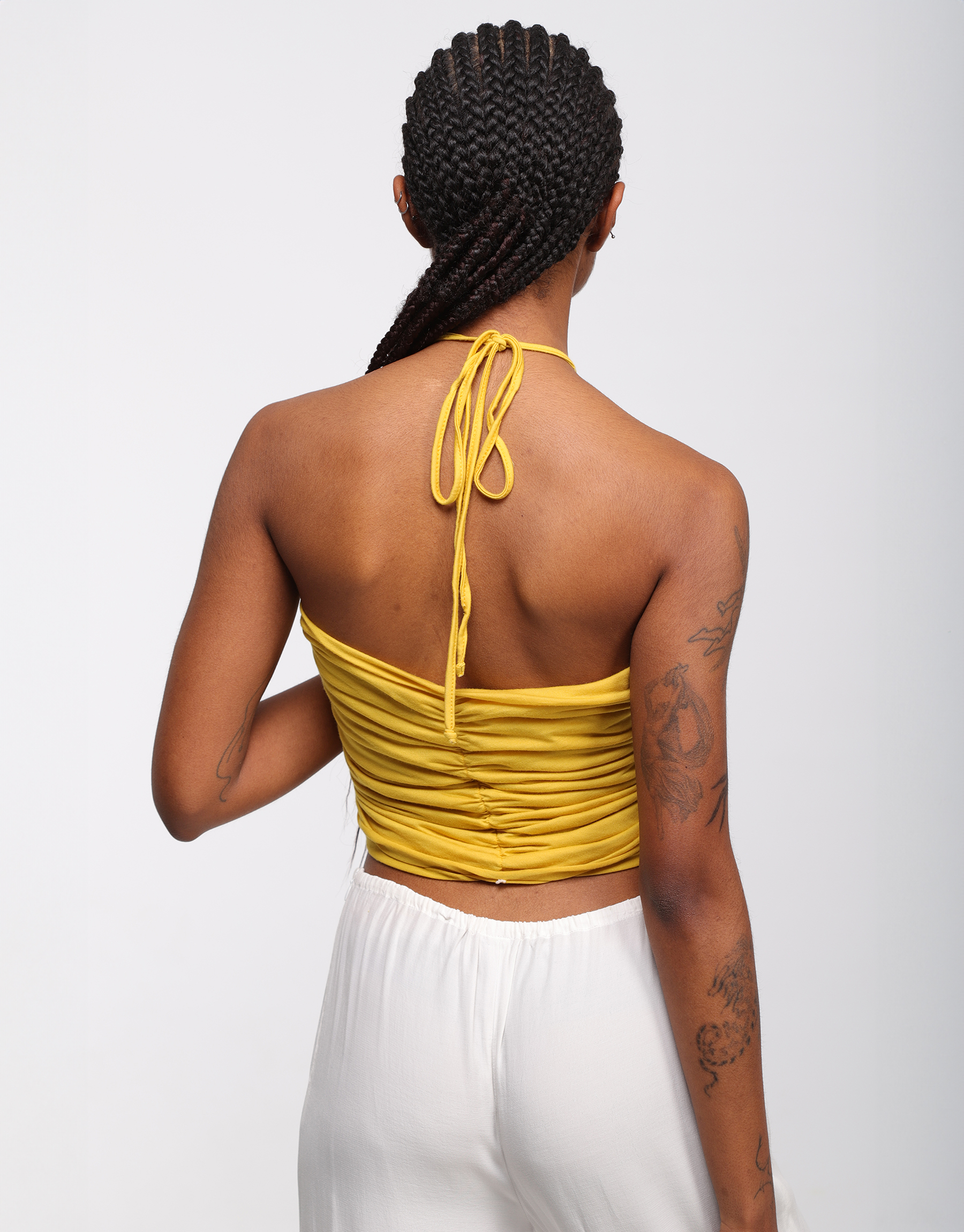 Top draped in yellow cotton jersey