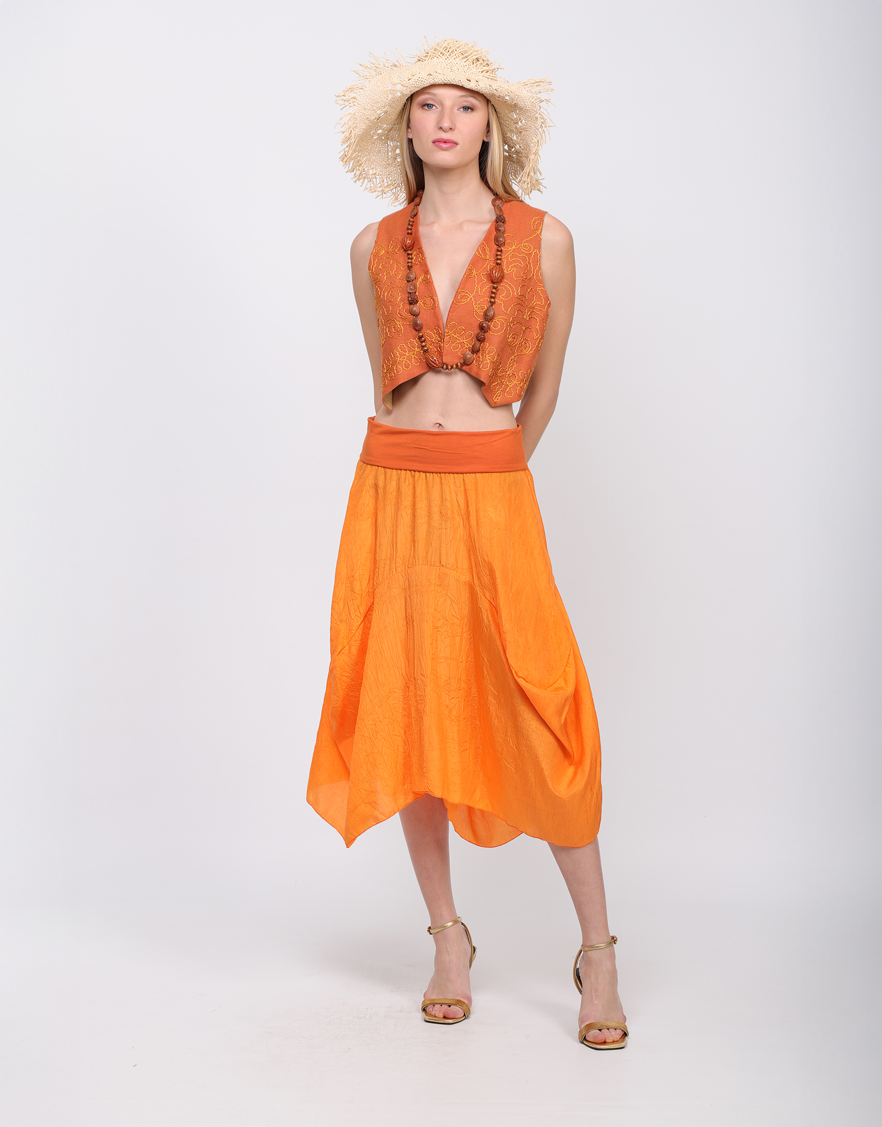 Long flowing skirt in orange or beige crumpled silk