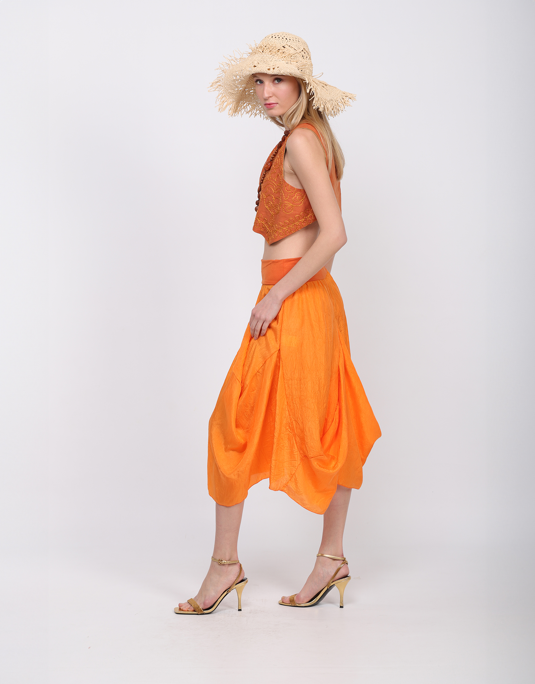 Long flowing skirt in orange or beige crumpled silk