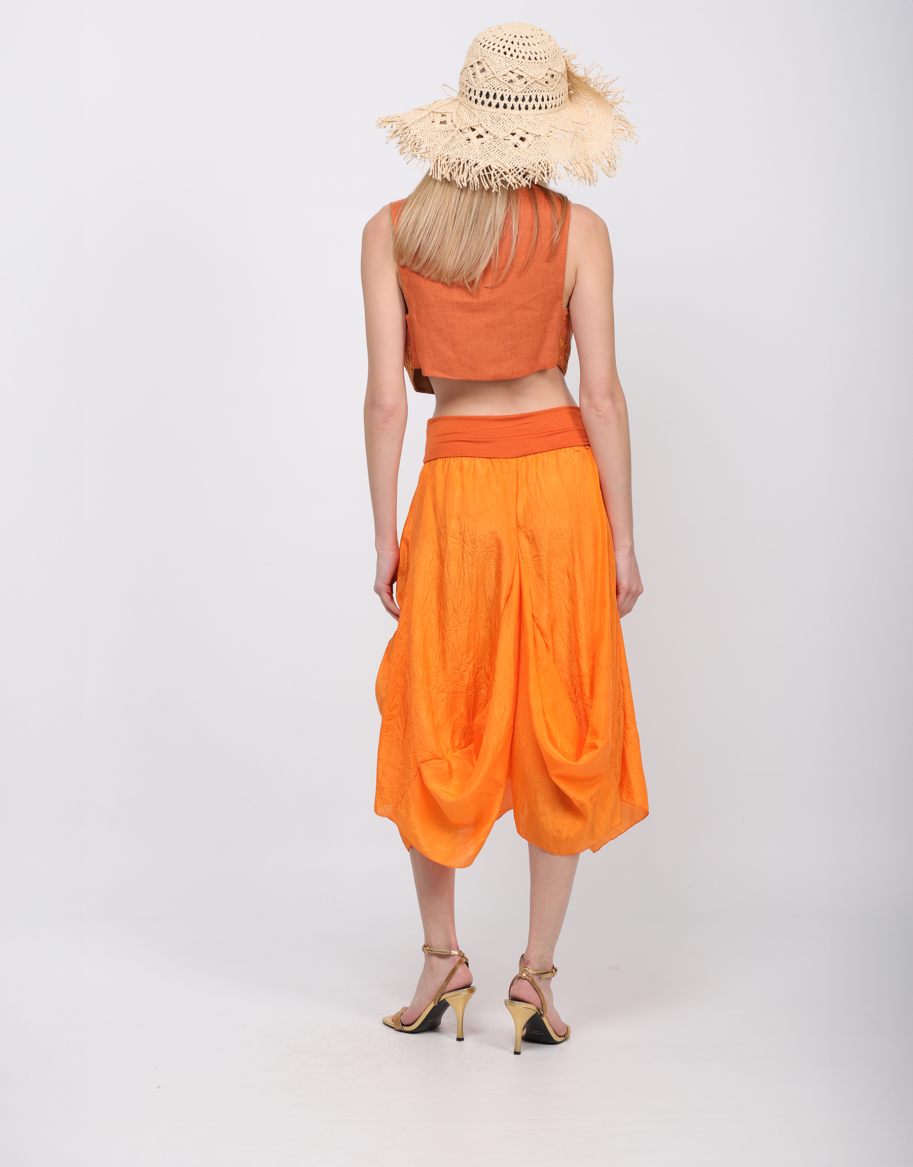 Long flowing skirt in orange or beige crumpled silk