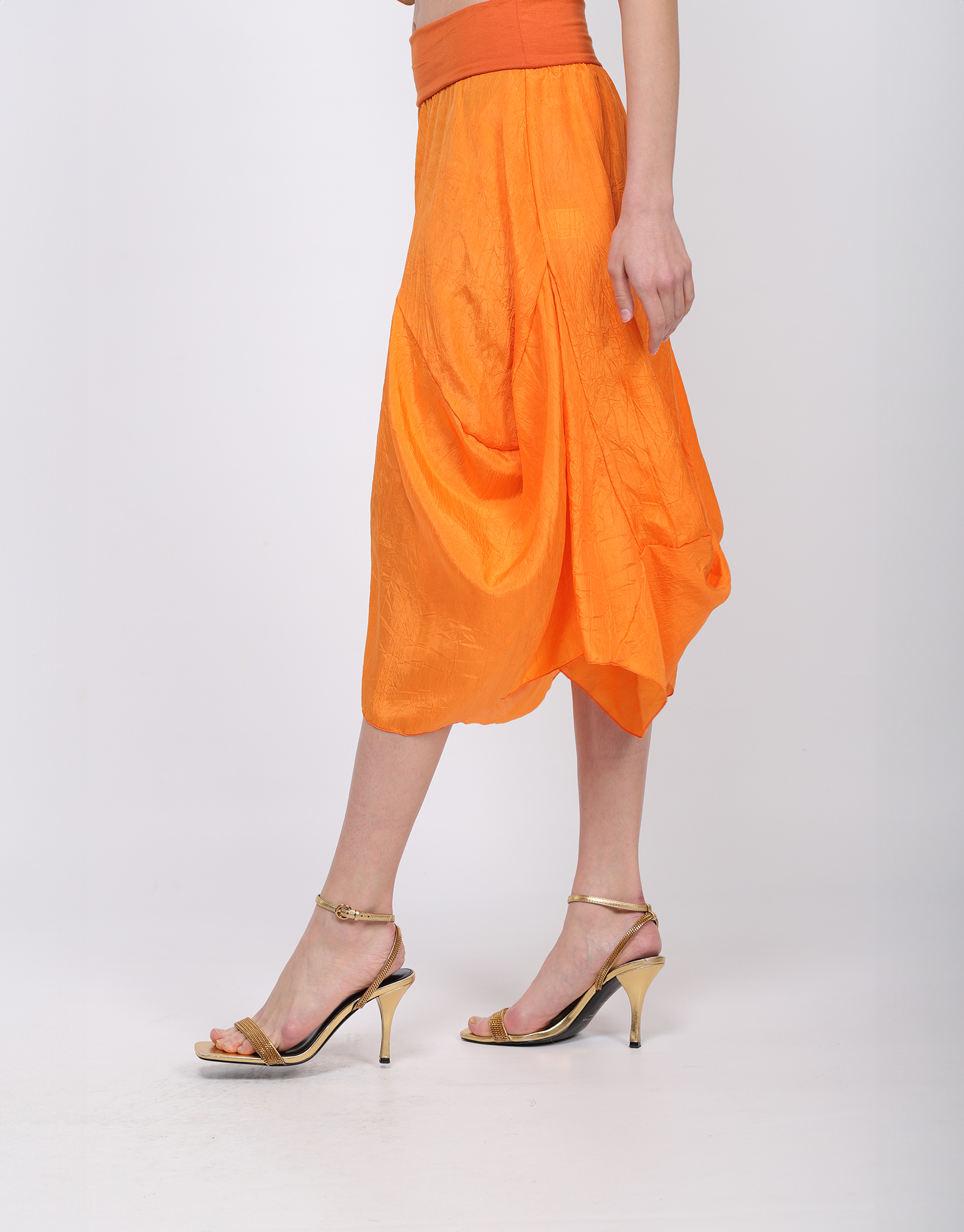 Long flowing skirt in orange or beige crumpled silk