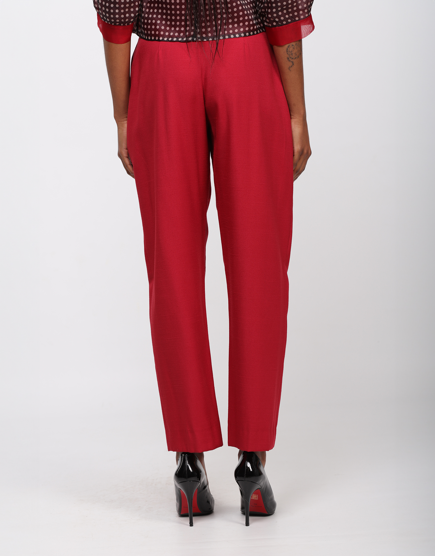 Trousers with pleats tightened at the bottom in red cotton and viscose